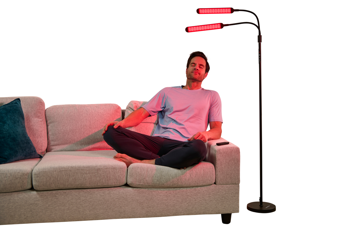 Man using red light therapy blog image