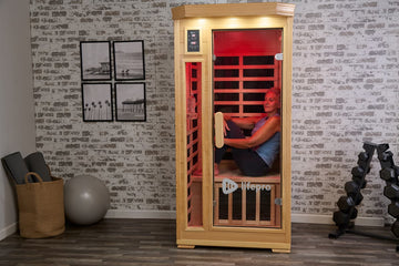 Woman using single person sauna