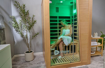 Woma using at-home sauna
