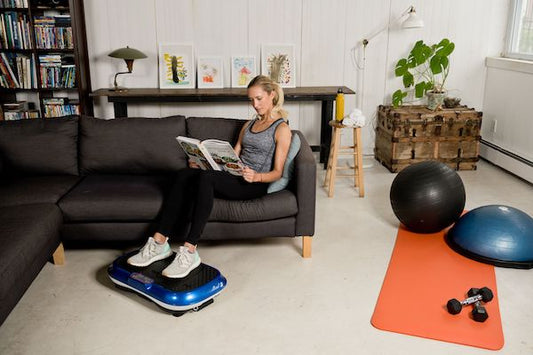 Female Sitting With Vibration Plate