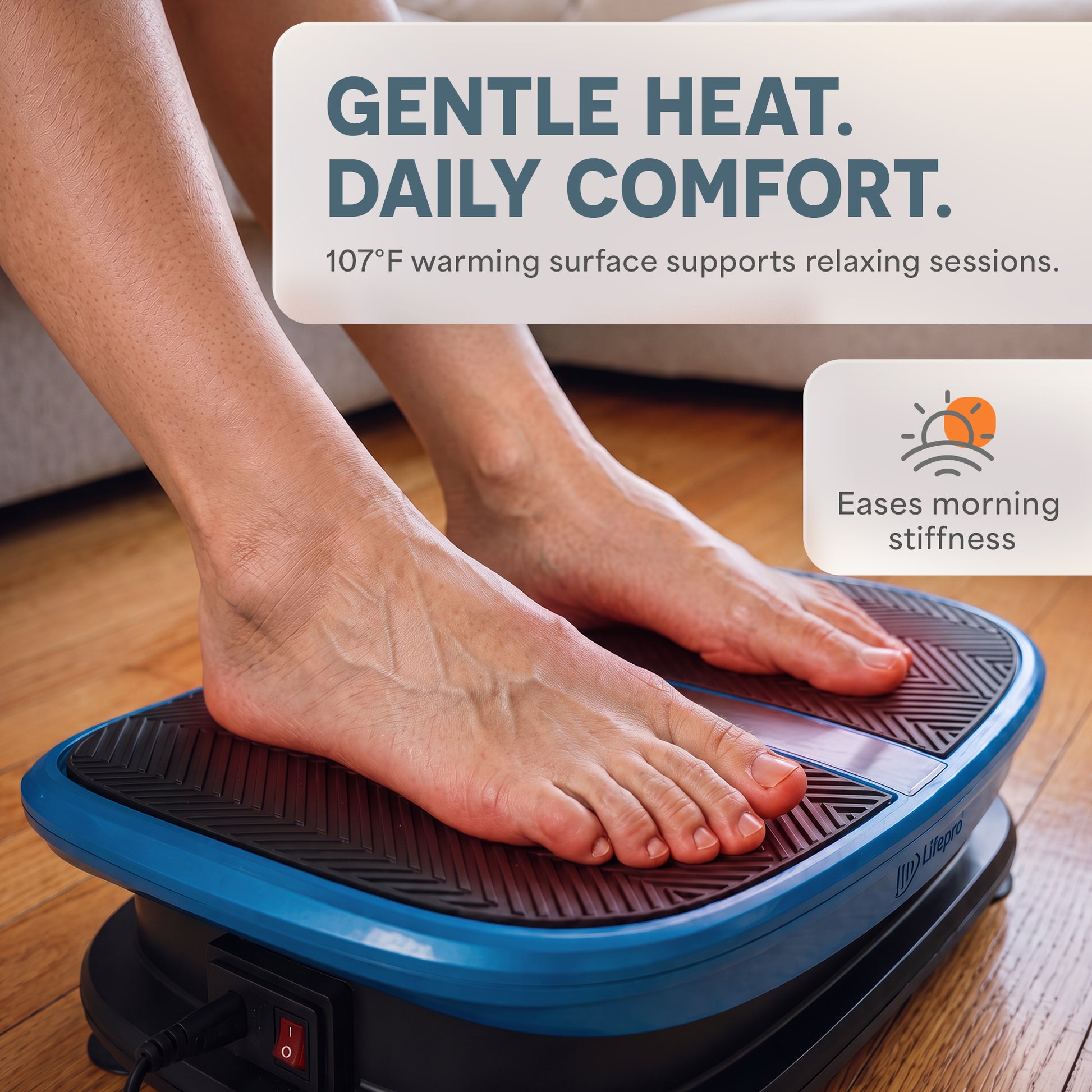 Close-up of bare feet resting on the VibraVoice plate's heated surface, with a Gentle Heat, Daily Comfort callout.